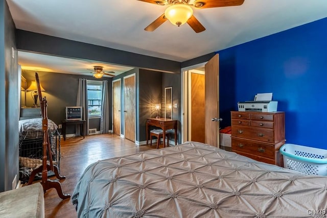 906 Beley Ave, Salina, NY 13211 - bedroom with wood finished floors, ceiling fan, and baseboards