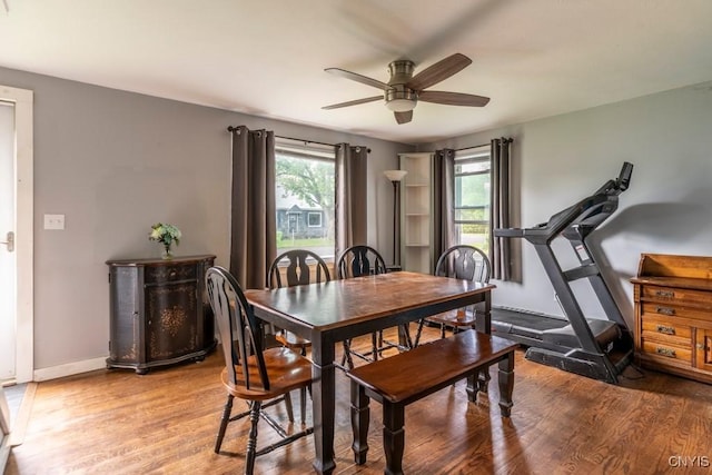 906 Beley Ave, Salina, NY 13211 - dining space featuring ceiling fan, light wood-type flooring, and baseboards