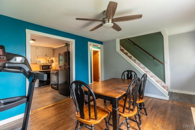 906 Beley Ave, Salina, NY 13211 - dining space with wood finished floors, stairs, ceiling fan, and baseboards
