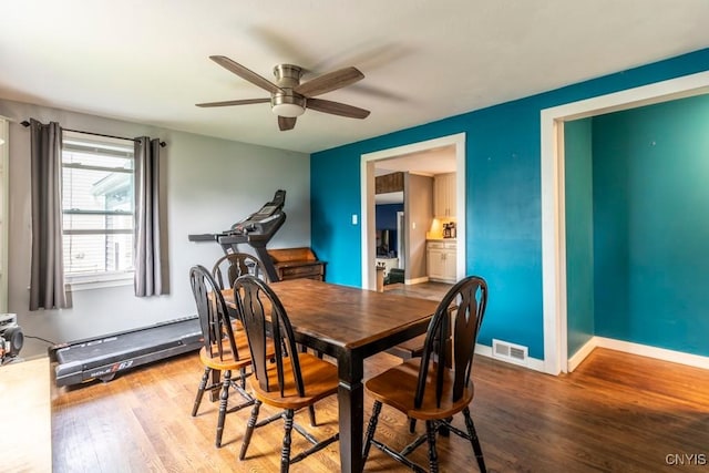 906 Beley Ave, Salina, NY 13211 - dining room with ceiling fan, wood finished floors, and baseboards
