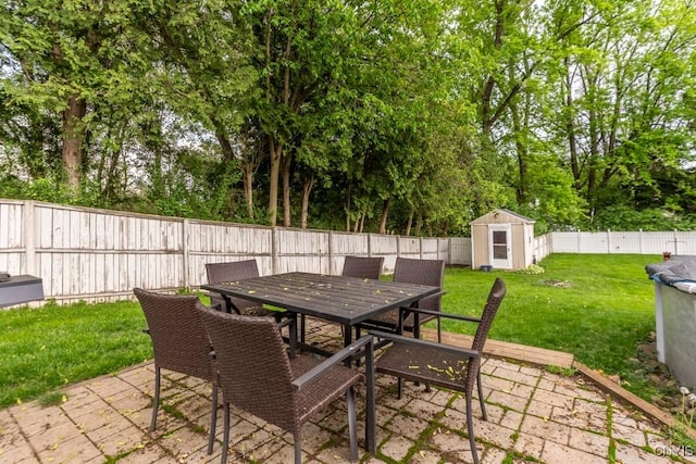 906 Beley Ave, Salina, NY 13211 - view of patio / terrace with outdoor dining space and view of wooded area