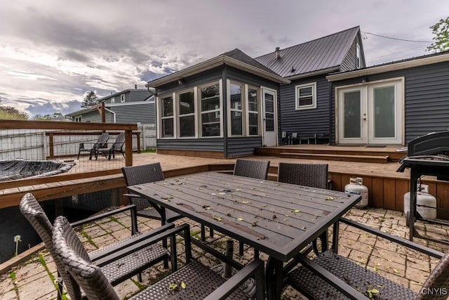 906 Beley Ave, Salina, NY 13211 - wooden deck with outdoor dining area, french doors, and a grill