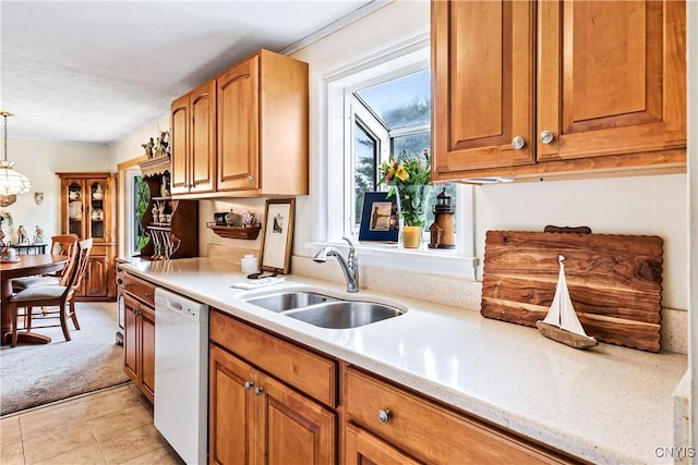 829 Franklin St, Skaneateles, NY 13152 - kitchen featuring dishwasher, a sink, light countertops, and plenty of natural light