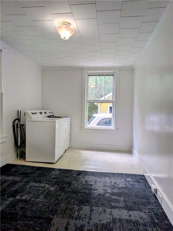 706 E Washington Ave, Elmira-City, NY 14901 - laundry room featuring washing machine and dryer, baseboards, and crown molding
