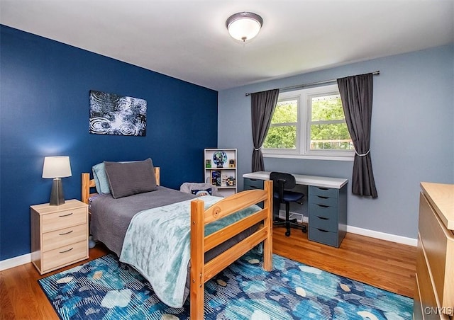 106 Peterson Dr, Camillus, NY 13031 - bedroom featuring wood finished floors and baseboards