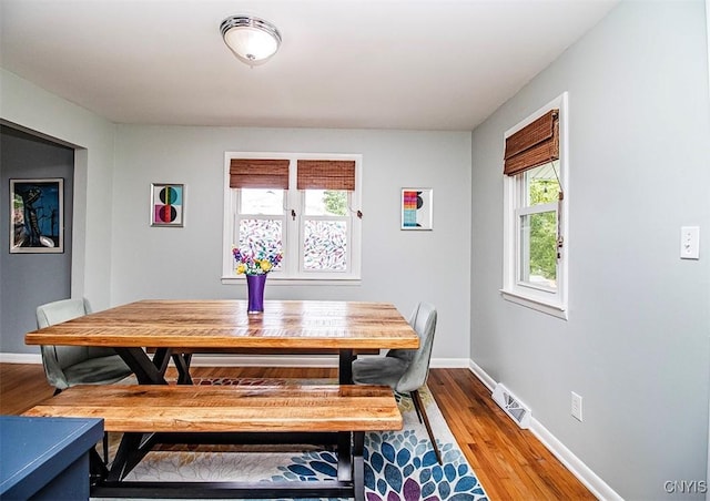 106 Peterson Dr, Camillus, NY 13031 - dining space with baseboards and wood finished floors