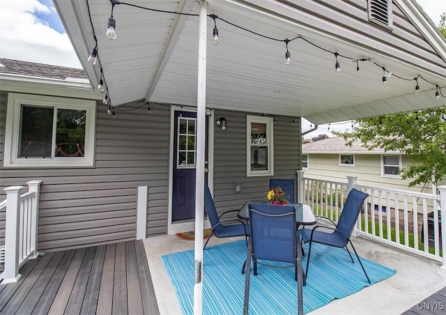 106 Peterson Dr, Camillus, NY 13031 - wooden terrace featuring outdoor dining area