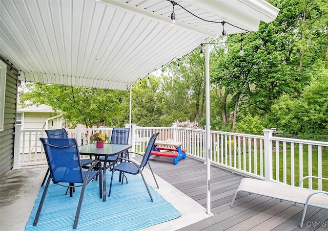 106 Peterson Dr, Camillus, NY 13031 - wooden deck with outdoor dining area