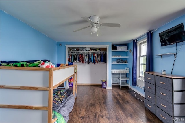44191 Lime St, Wilna, NY 13665 - bedroom featuring dark wood-style floors, a closet, a ceiling fan, and baseboards