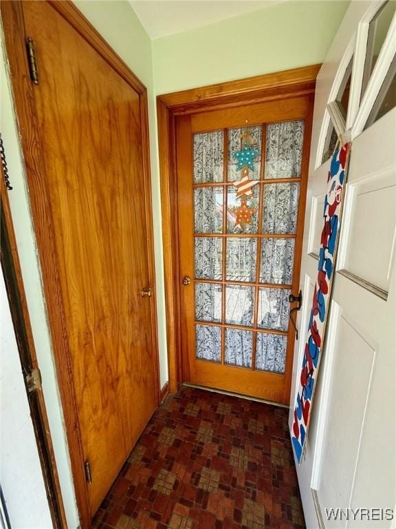 815 91st St, Niagara Falls, NY 14304 - doorway featuring brick patterned floors