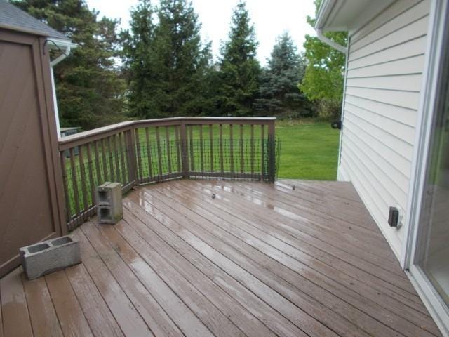 35 Belltower Ln, Henrietta, NY 14534 - wooden deck with a lawn