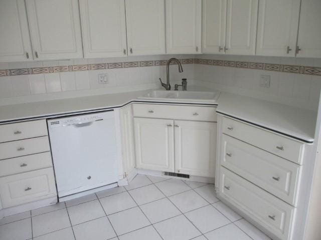 35 Belltower Ln, Henrietta, NY 14534 - kitchen featuring dishwasher, a sink, light countertops, and white cabinetry