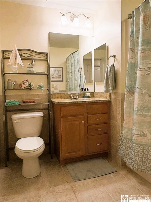 50 Lakeside Dr Unit C103, Ellery, NY 14712 - full bath with vanity, toilet, tile patterned flooring, tile walls, and a shower with curtain