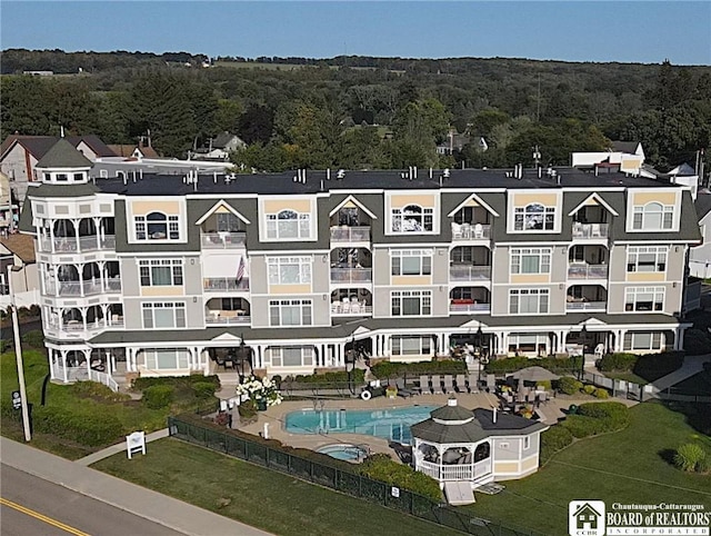 50 Lakeside Dr Unit C103, Ellery, NY 14712 - view of building exterior featuring a wooded view