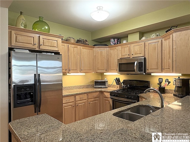 50 Lakeside Dr Unit C103, Ellery, NY 14712 - kitchen featuring stainless steel appliances, dark stone countertops, and a sink