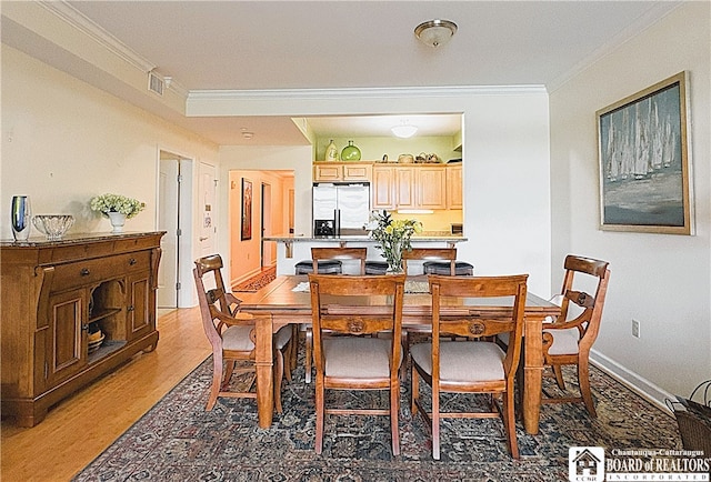 50 Lakeside Dr Unit C103, Ellery, NY 14712 - dining area featuring ornamental molding and light wood-style flooring