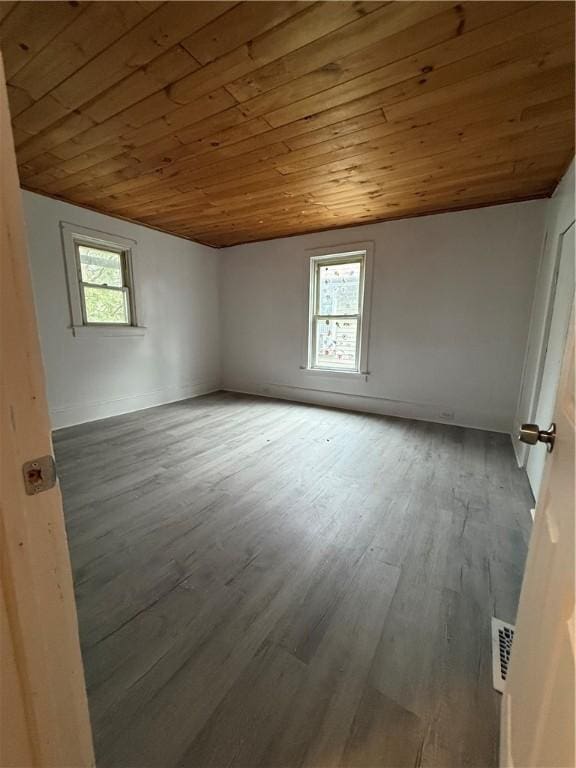 307 W Hudson St, Elmira-City, NY 14904 - empty room featuring wooden ceiling, plenty of natural light, wood finished floors, lofted ceiling, and baseboards