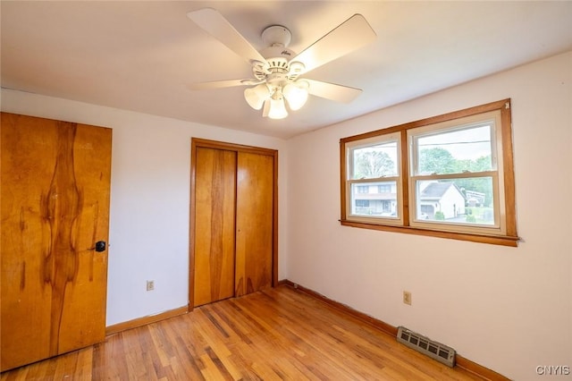 7634 Anne Ter, Clay, NY 13212 - unfurnished bedroom featuring baseboards, light wood-style flooring, a closet, and ceiling fan