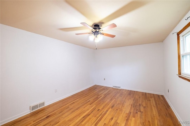 7634 Anne Ter, Clay, NY 13212 - spare room featuring light wood finished floors, a ceiling fan, and baseboards