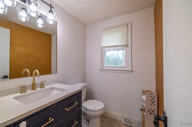 7634 Anne Ter, Clay, NY 13212 - half bathroom featuring toilet, vanity, tile patterned flooring, and baseboards