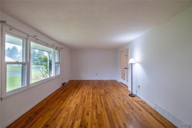 7634 Anne Ter, Clay, NY 13212 - empty room with light wood finished floors and baseboards