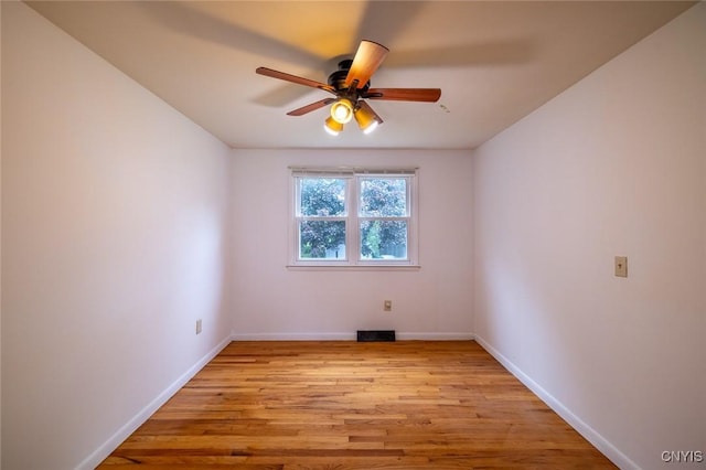 7634 Anne Ter, Clay, NY 13212 - unfurnished room with ceiling fan, light wood-type flooring, and baseboards