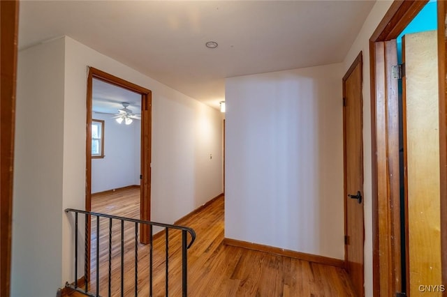 7634 Anne Ter, Clay, NY 13212 - hallway featuring light wood-style flooring and baseboards