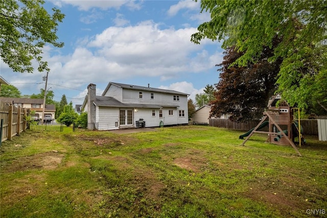 7634 Anne Ter, Clay, NY 13212 - rear view of house with a patio area, a chimney, a playground, and french doors