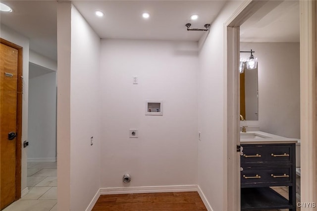 7634 Anne Ter, Clay, NY 13212 - laundry area with hookup for an electric dryer, washer hookup, recessed lighting, and baseboards