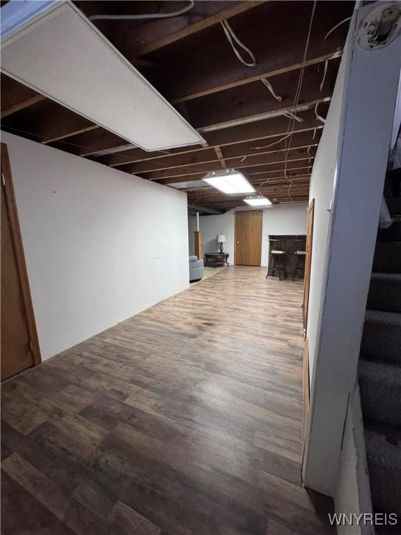 9357 Steffi Dr, Evans, NY 14006 - finished basement featuring wood finished floors
