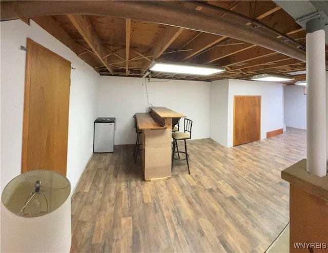 9357 Steffi Dr, Evans, NY 14006 - finished below grade area with wood finished floors