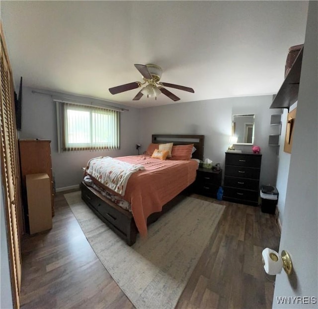 9357 Steffi Dr, Evans, NY 14006 - bedroom with wood finished floors and a ceiling fan