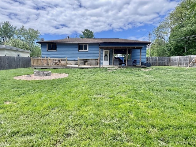 9357 Steffi Dr, Evans, NY 14006 - back of property featuring a fire pit and a deck