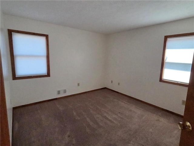 70 Crestway Ln, Greece, NY 14612 - carpeted spare room with baseboards