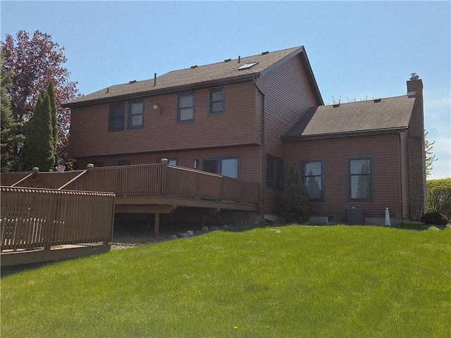 70 Crestway Ln, Greece, NY 14612 - rear view of property with a wooden deck, a lawn, a chimney, and central AC unit