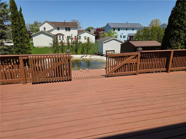 70 Crestway Ln, Greece, NY 14612 - wooden deck featuring a residential view
