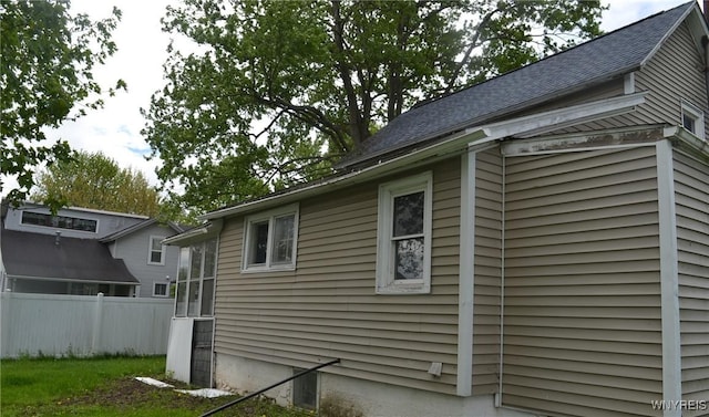 118 Laurel St, Ridgeway, NY 14103 - view of side of home with a shingled roof