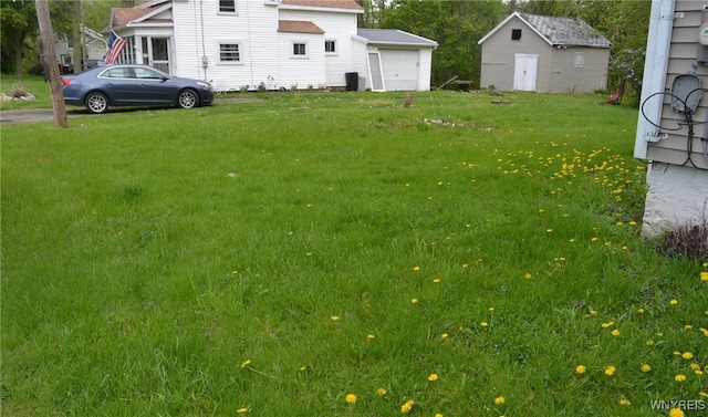 118 Laurel St, Ridgeway, NY 14103 - view of grassy yard with an outbuilding