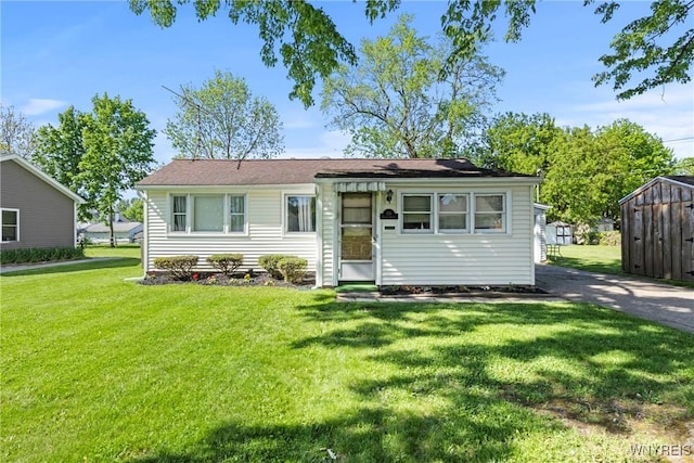 136 Elwood Ave, Ridgeway, NY 14103 - view of front of house featuring a front yard