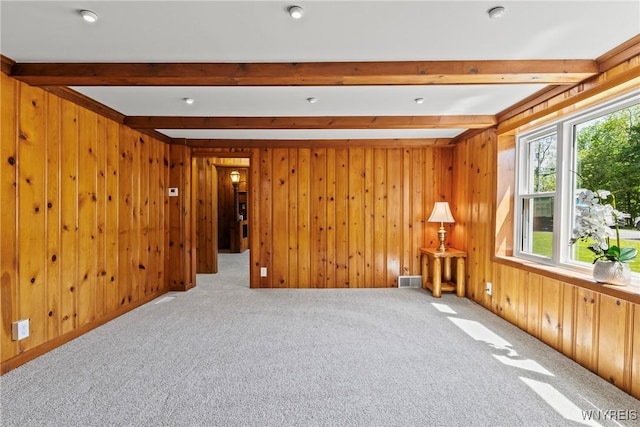 5302 William St, Lancaster, NY 14086 - unfurnished room with beam ceiling, carpet, and wood walls