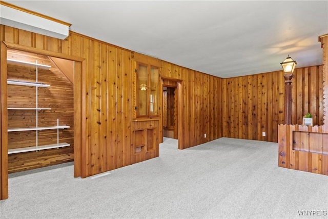 5302 William St, Lancaster, NY 14086 - unfurnished room with carpet flooring and wood walls