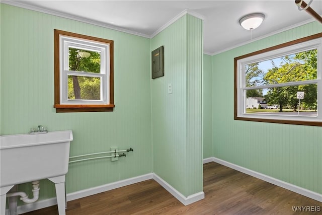 5302 William St, Lancaster, NY 14086 - washroom featuring crown molding, wood finished floors, and baseboards