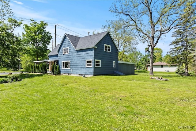 5302 William St, Lancaster, NY 14086 - view of property exterior with a yard and roof with shingles