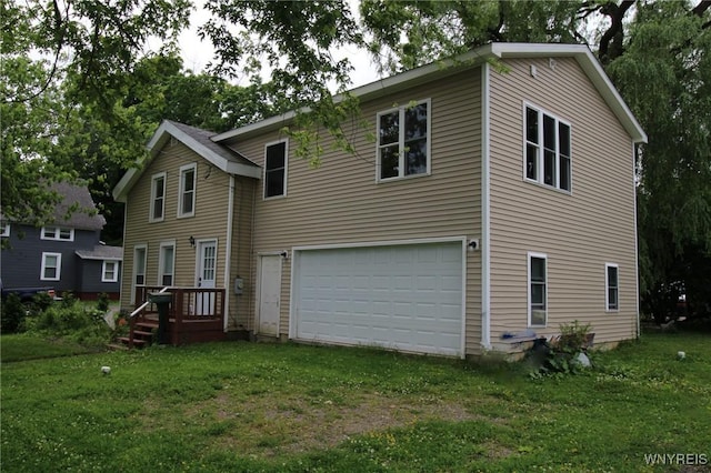 21 Maple St, Evans, NY 14006 - traditional-style house with an attached garage and a front lawn