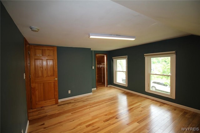 21 Maple St, Evans, NY 14006 - unfurnished bedroom with light wood finished floors