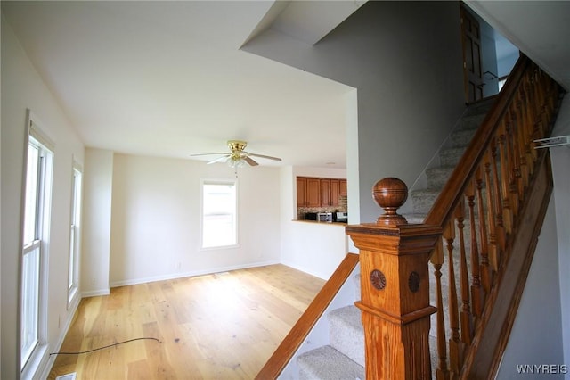 21 Maple St, Evans, NY 14006 - stairs featuring wood finished floors and a ceiling fan