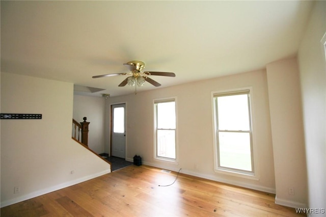 21 Maple St, Evans, NY 14006 - entryway with stairway, light wood-style flooring, and ceiling fan