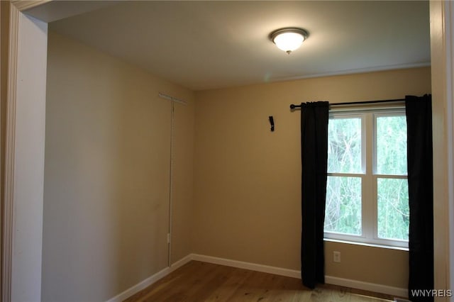 21 Maple St, Evans, NY 14006 - unfurnished room featuring baseboards and wood finished floors