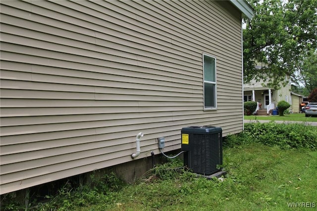 21 Maple St, Evans, NY 14006 - view of property exterior with a central air condition unit