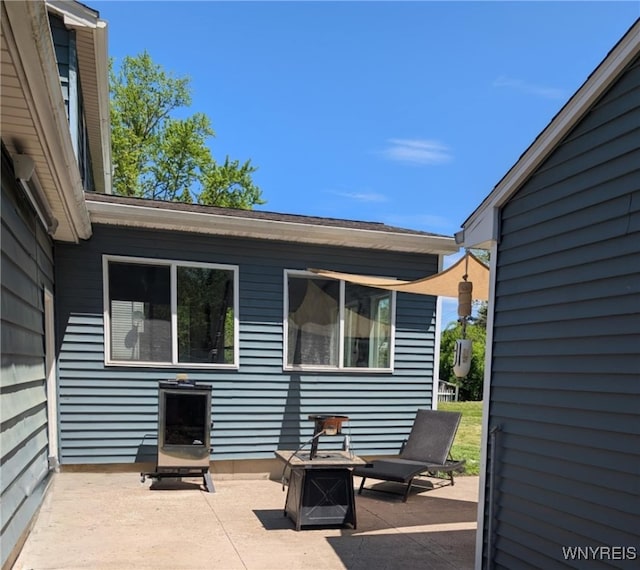 343 Carrollwood Dr, Porter, NY 14174 - view of patio with an outdoor fire pit